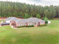 3 BR / 2 BA Brick Home on 24.60+/- acres with shop and pond