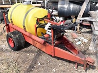 Demco trailer mounted sprayer powered by a