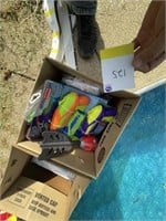 Box of squirt guns, pool toys
