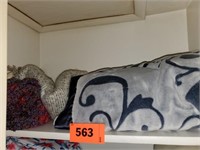 FLEECE THROWS AND SUCH ON SHELF