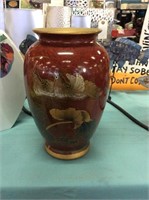 Vase with bird and flowers