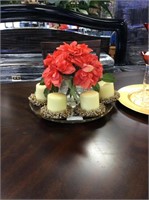 Centerpiece with four candles and flowers on tray