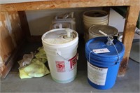 Group of Cleaning Chemicals and Rags