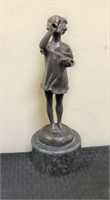 Bronze girl figure