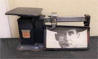Vintage Triner scale w/ man photo