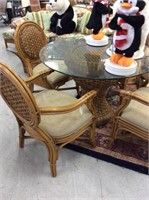 Rattan glass table top table and four chairs