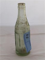 Soda water bottling company bottle
property of