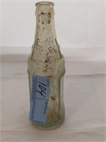 Soda water bottling company bottle
Property of