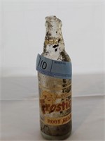Frostie root beer bottle
Note broken off at top