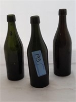3 green vintage bottles