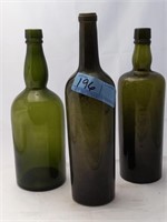 3 green vintage bottles
