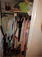 Contents of closet- clothing, linens, iron,