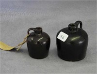 Pair of Albany slip mini jugs, both around 2" high