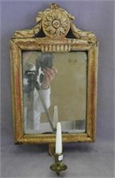 Baroque mirror and sconce