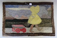 Hooked rug of Sunbonnet girl, 34" x 22 1/2"