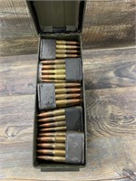 Ammo can filled with 30-06 cartridges loaded into