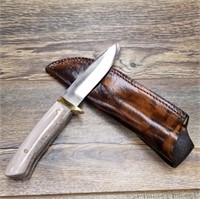 Fixed bladed knife with brass guard. Moose antler