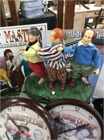 Three stooges golf academy statue