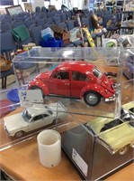 Red Volkswagen beetle model car
