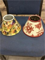 Two ceramic candle shades