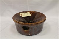 Unmarked pottery bowl with top and side hole