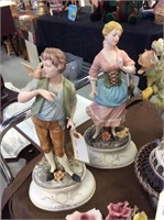 Set of bisque  male and female figurines