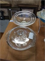 Set of three Pyrex bowls and one casserole