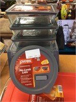Set of five no leak lids Pyrex cooking dishes