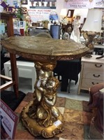 Golden double Cupid side table