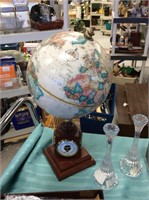 World globe with barometers