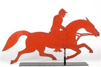 Impressive cut-out sheet-iron jockey and race horse weathervane retaining early red-painted surface, from a NYS race track