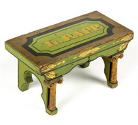 One of several paint-decorated footstools