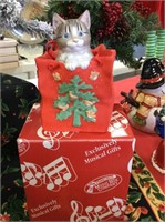 San Francisco music box company cat in a bag