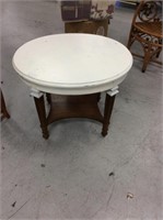 White and brown oval side table