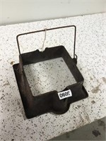 Cast iron stand for waffle maker. No markings