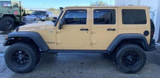 2013 Jeep Wrangler Unlimited Sahara | Apple Towing Co