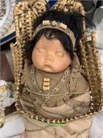 PORCELAIN PAPOOSE DOLL