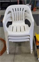 3 white plastic lawn chairs