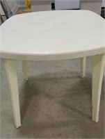 35x34x29in. White plastic table