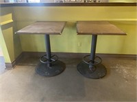 Correction - (2) High top tables with metal bases.