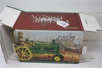 JOHN DEERE "A" TOY TRACTOR WITH RED MCCUNE FIGUR