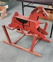Extremely early rocking horse he has a small