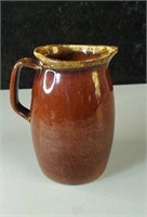 Brown drip oven proof pitcher approx 7 inches tall