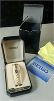 Woman's Seiko watch with what appears to be