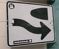 Black and white curve road sign approx 30 x 25