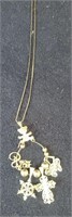 14kt gold necklace with charms necklace is approx