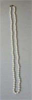 Strand of faux pearls Approx 30 inches long