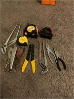 3 tape measures and plier sets