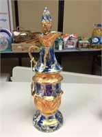 Blue and gold tone decanter made by Jim beam
