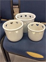 Set a three white heart cut out pottery planters